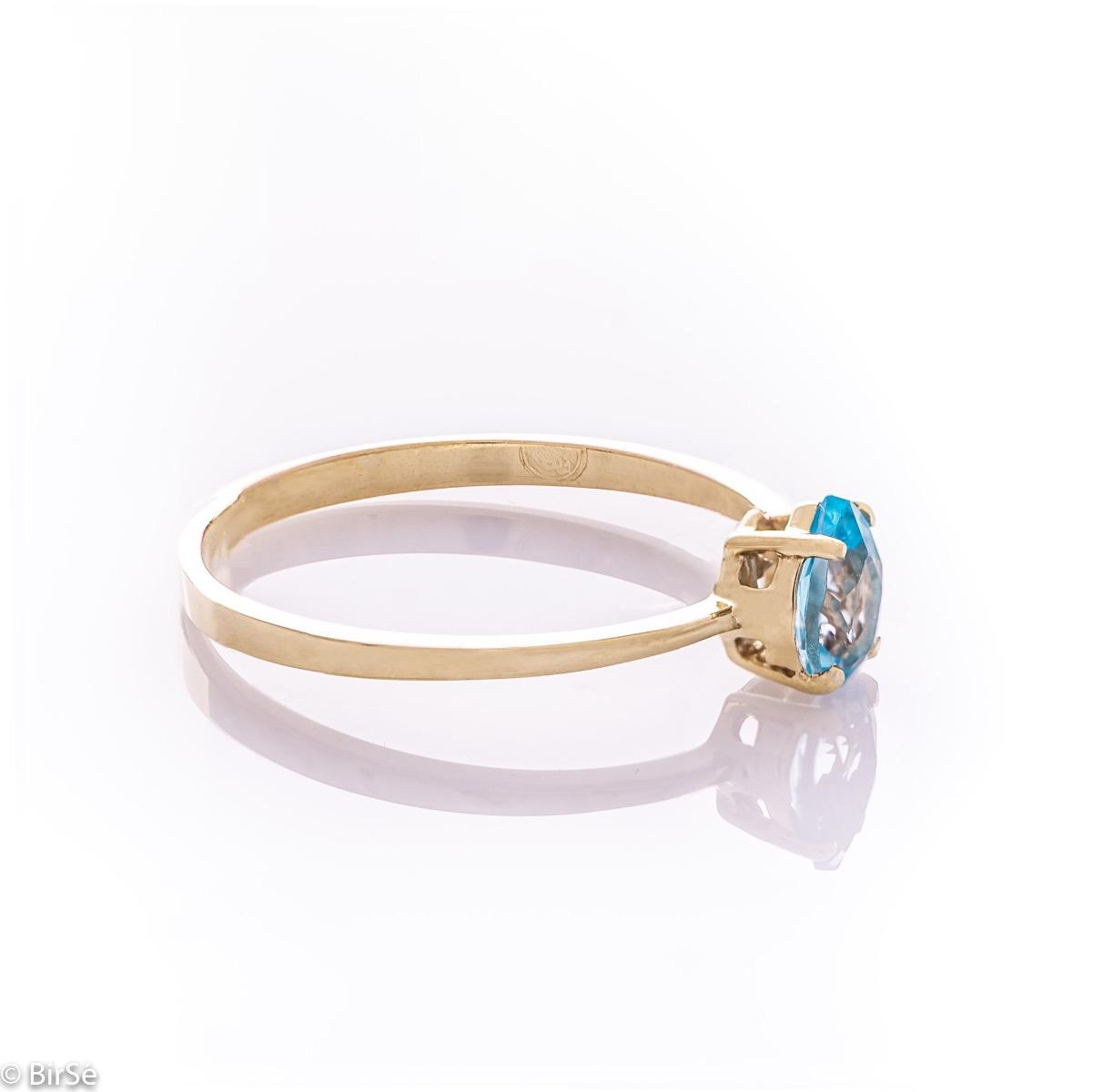 Златен пръстен - Естествен син топаз 0,50 ct