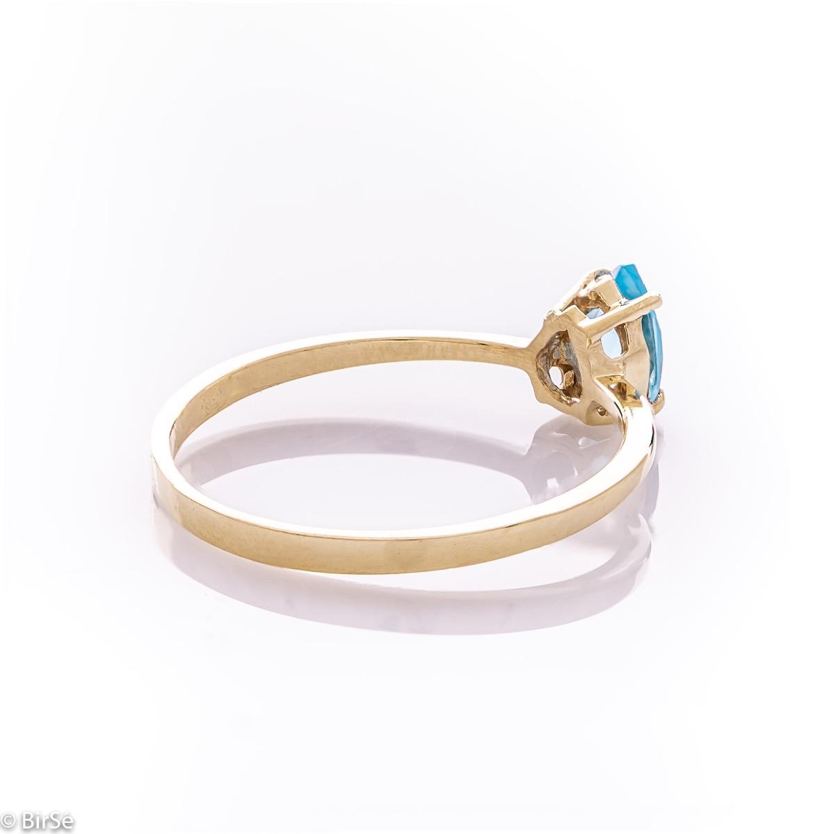 Златен пръстен - Естествен син топаз 0,50 ct