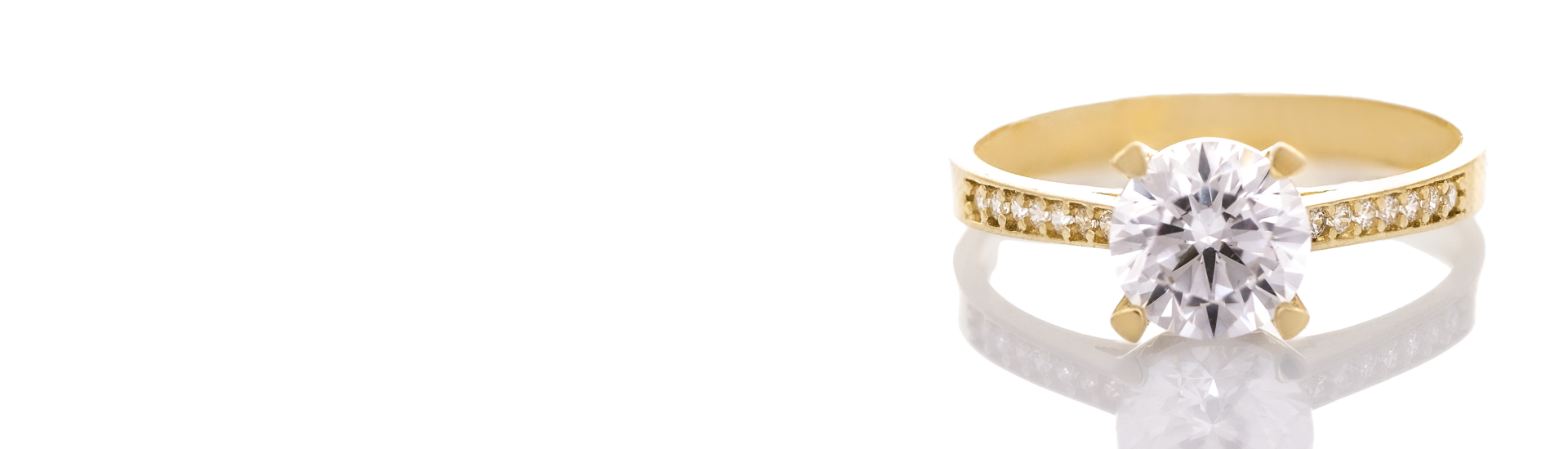 Златни годежни пръстени с циркони