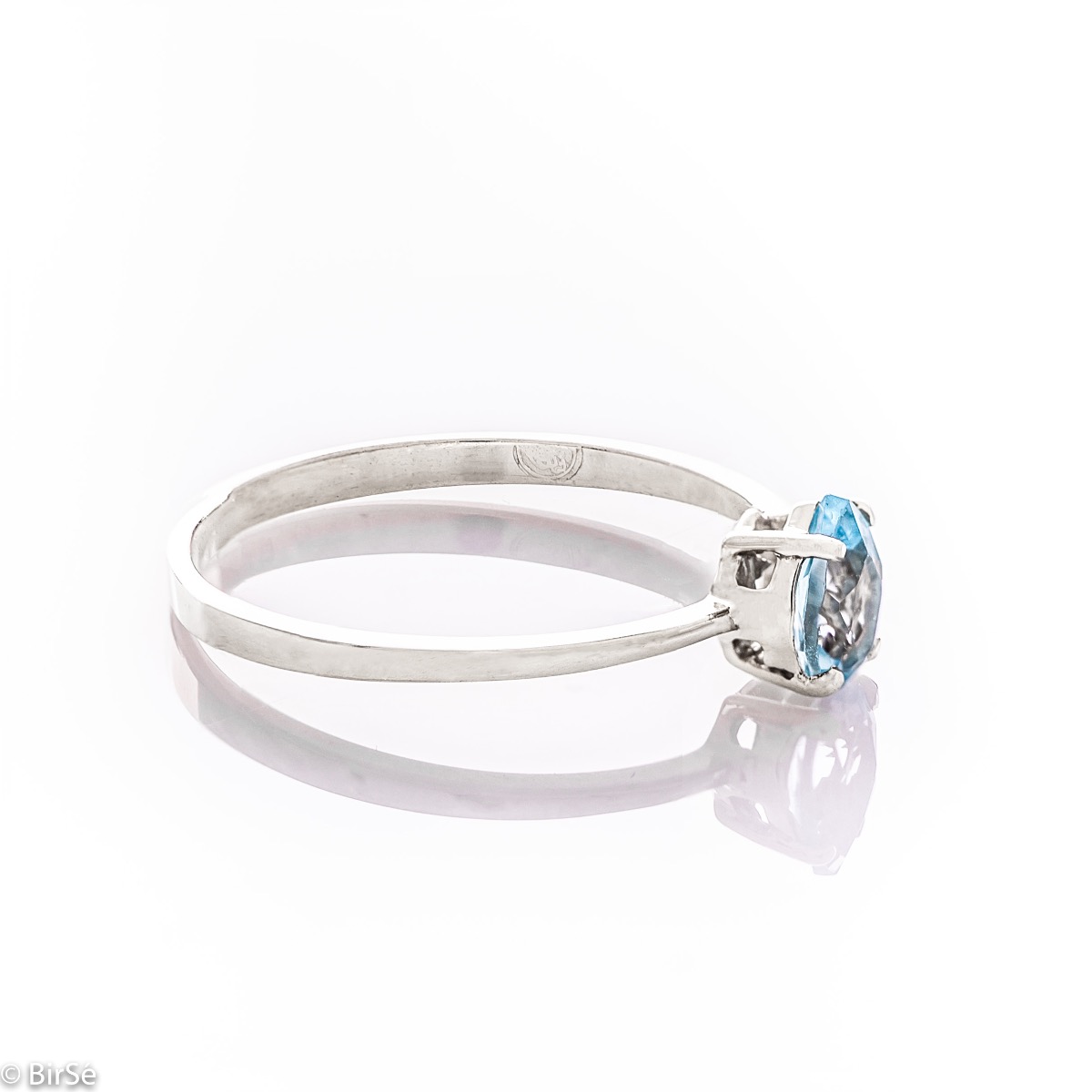 Златен пръстен - Естествен син топаз 0,50 ct