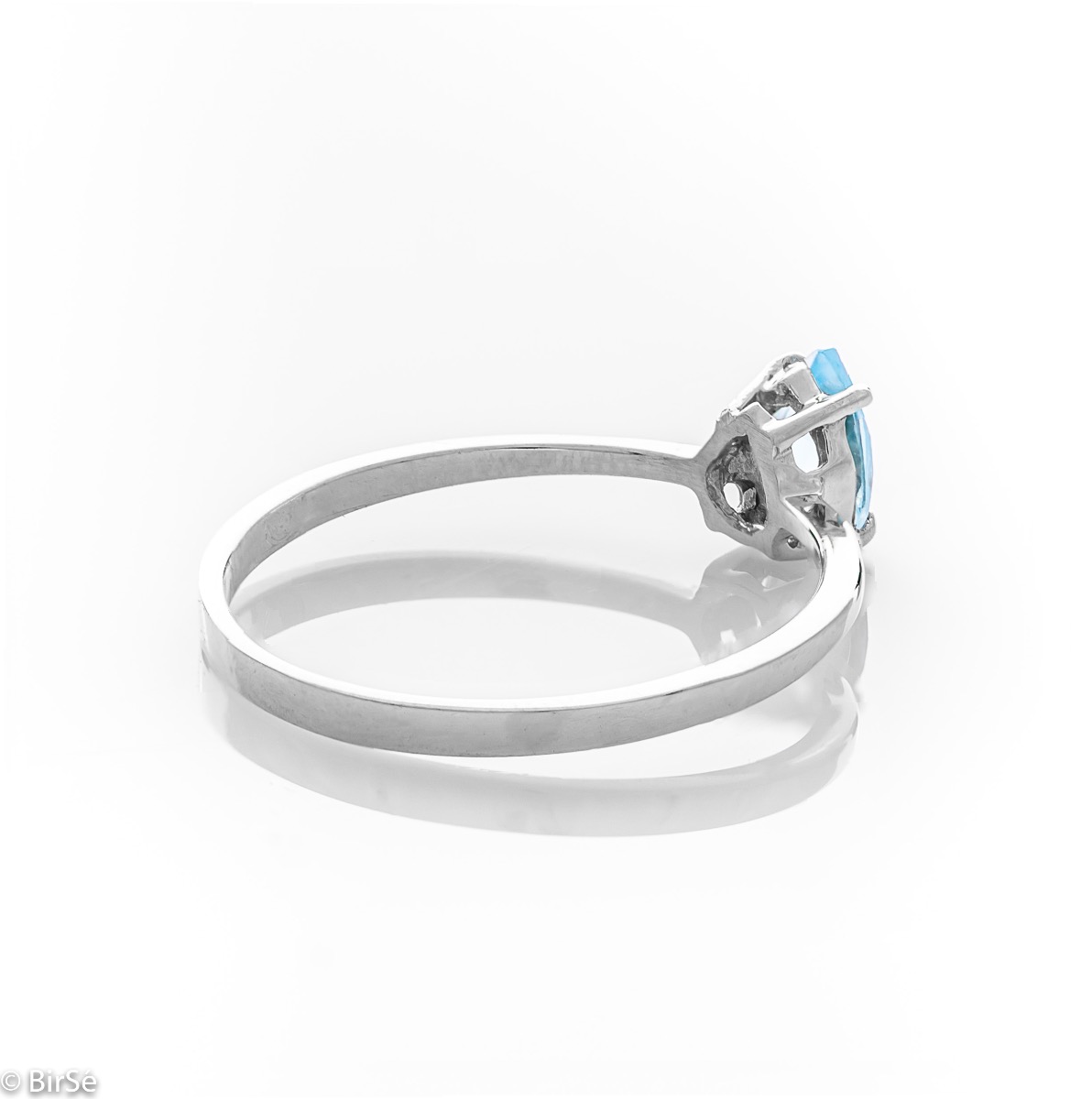 Златен пръстен - Естествен син топаз 0,50 ct