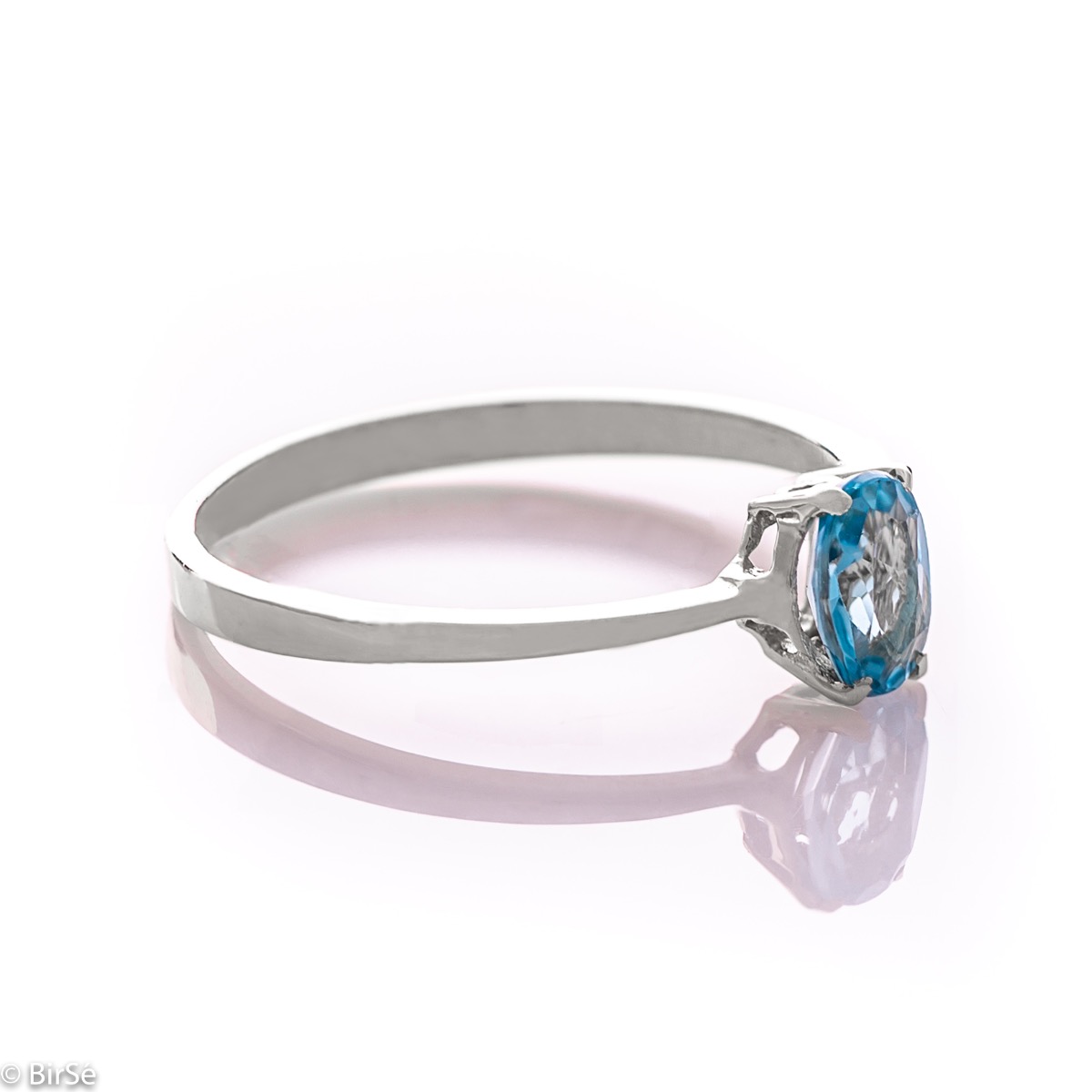 Златен пръстен - Естествен син топаз 0,57 ct