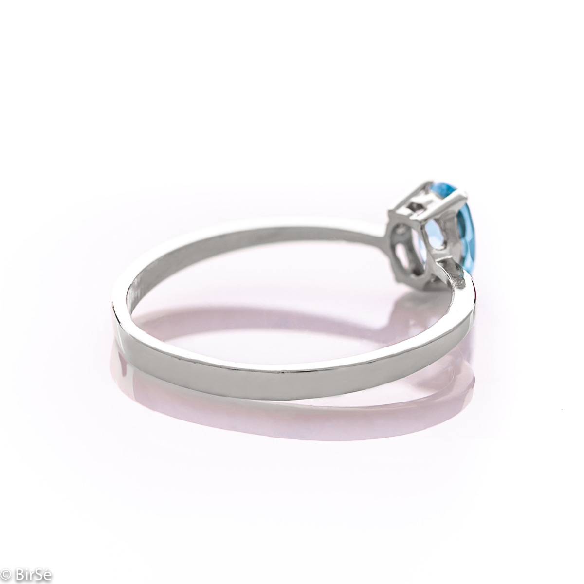 Златен пръстен - Естествен син топаз 0,57 ct